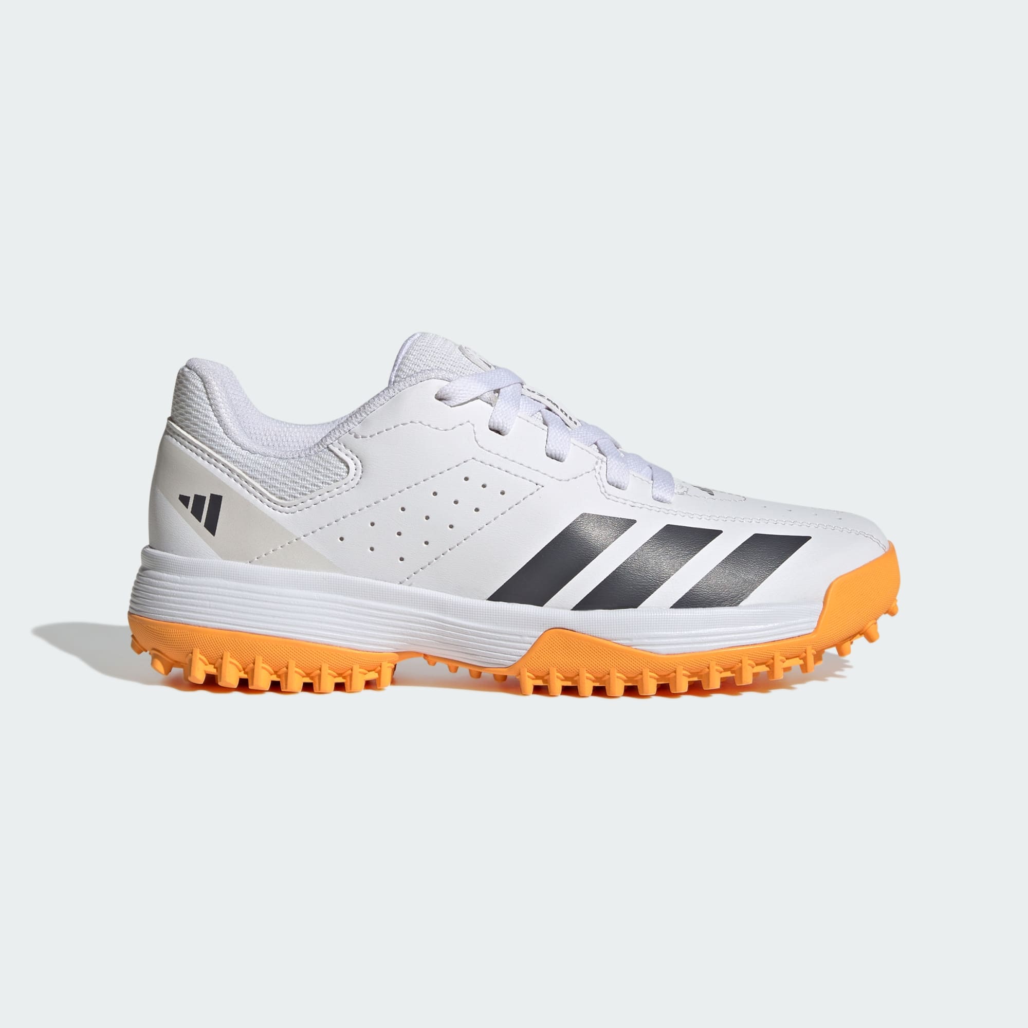 Adidas Howzat Spikeless Junior cricket shoes in white - side view