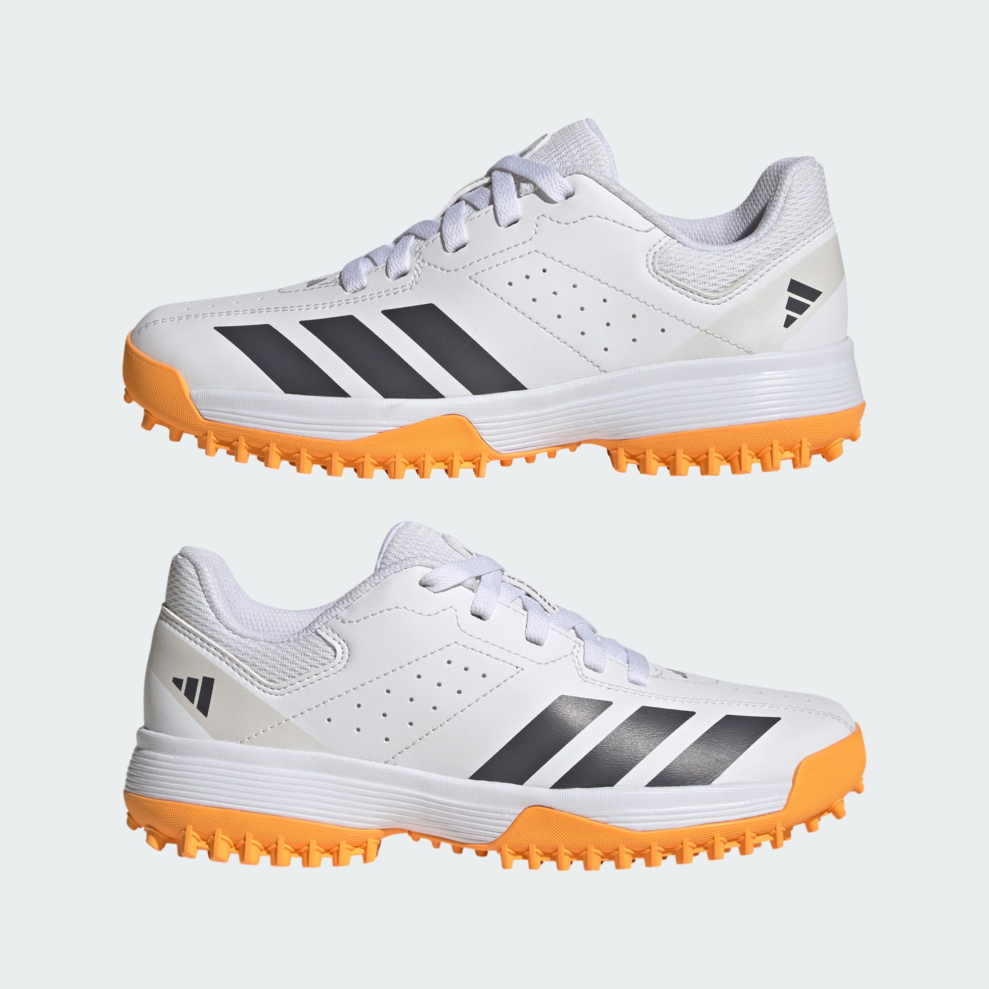 Adidas Howzat Spikeless Junior cricket shoes - pair view